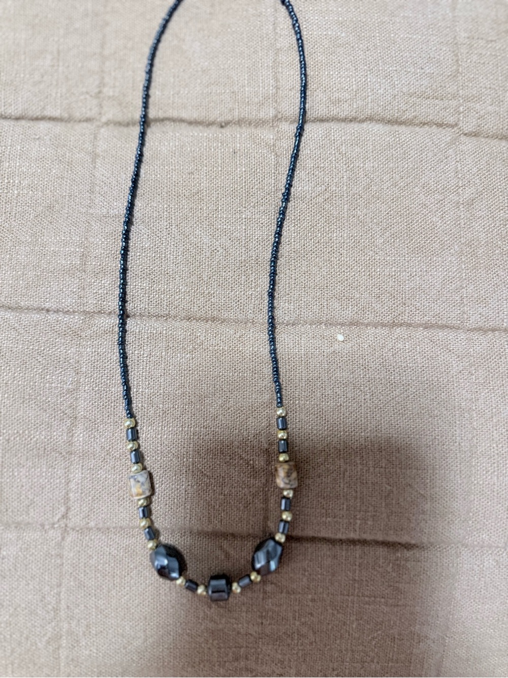 Black Beaded Necklace with Brown and Gold Accents